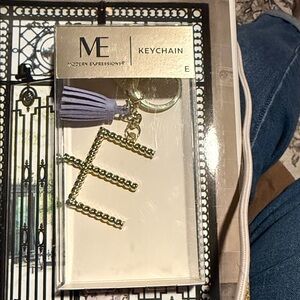 Expressions Gold Keychain with Purple Tassel